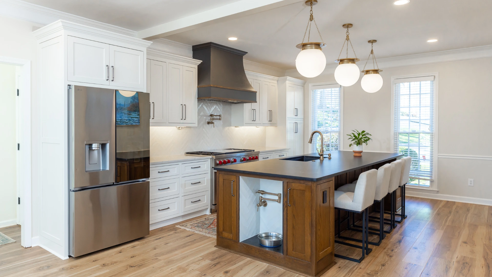 Newly added custom, white kitchen cabinets.